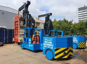 Install of a YCT 600 Press offloaded, de-crated and positioned into the factory.