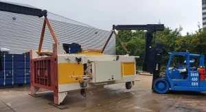 Install of a YCT 600 Press offloaded, de-crated and positioned into the factory.